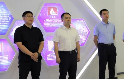 省委台办主任谢军莅临九洲国际官网走访调研